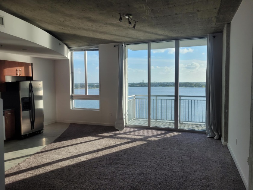 WONDERFUL & UNOBSTRUCTED LAKE VIEW / CONDO WITH BEAUTIFUL - Beach Condo for sale in West Palm Beach, Florida on Beachhouse.com