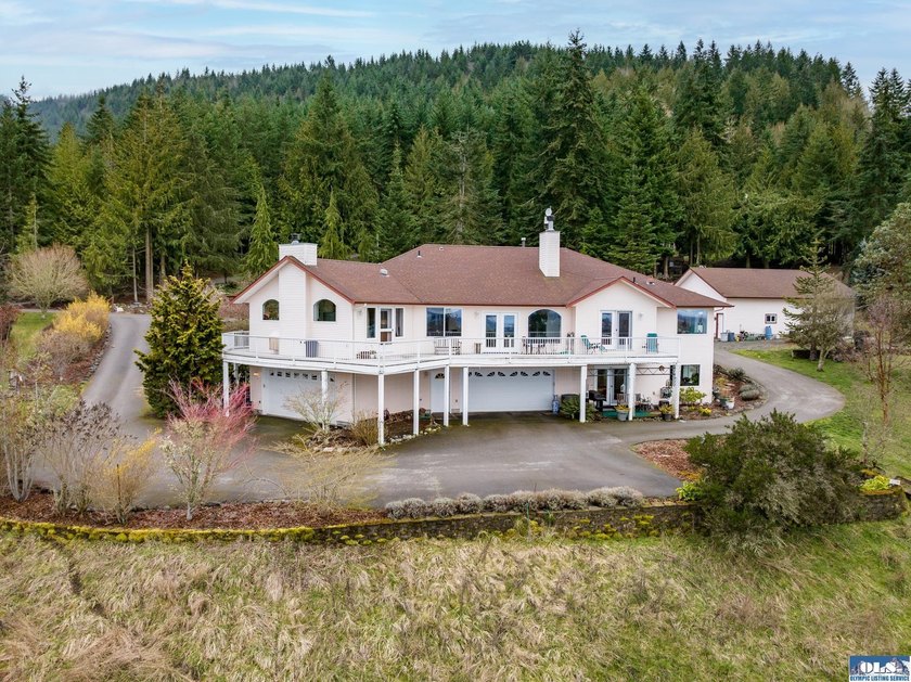 Perched on 5 private acres in desirable Happy Valley, this - Beach Home for sale in Sequim, Washington on Beachhouse.com