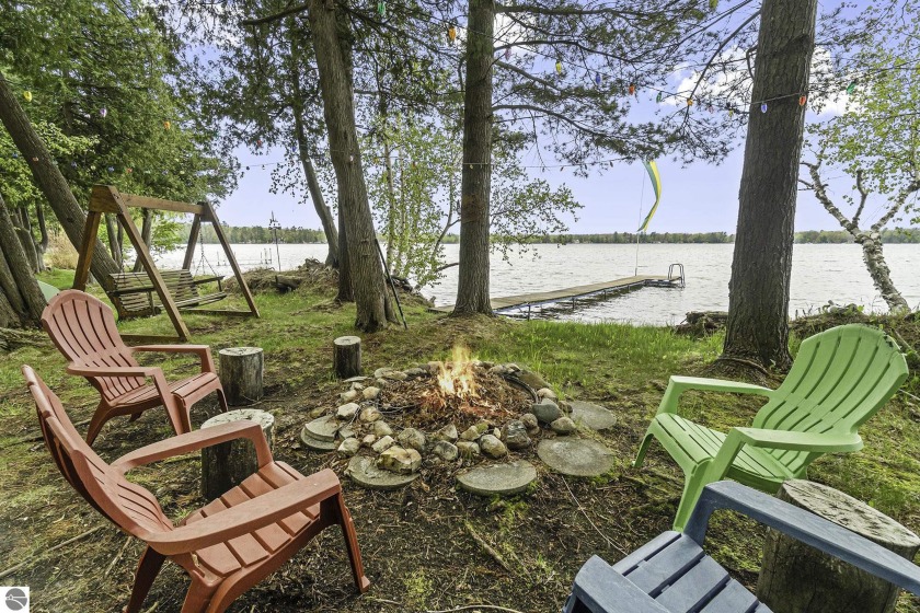 This cottage will take you back to a simpler time, when the - Beach Home for sale in Kewadin, Michigan on Beachhouse.com