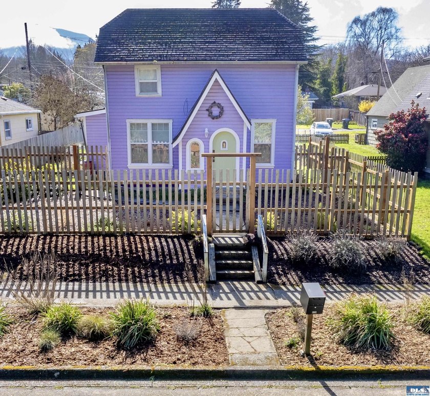 This storybook-inspired 1917 cottage blends vintage charm with - Beach Home for sale in Port Angeles, Washington on Beachhouse.com