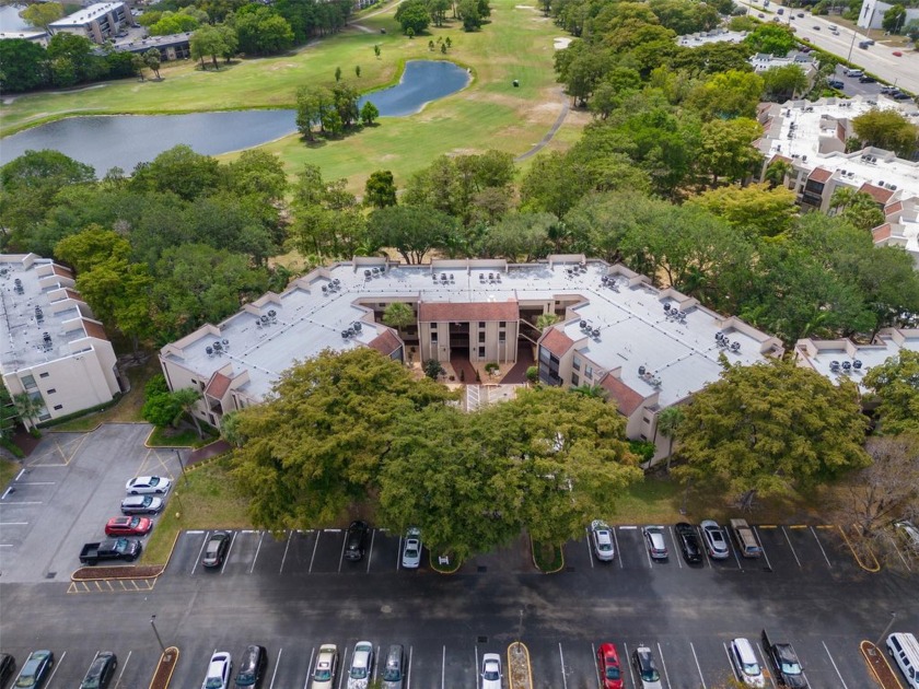 Bright and spacious 2 bed, 2 bath corner unit with serene garden - Beach Condo for sale in Tamarac, Florida on Beachhouse.com