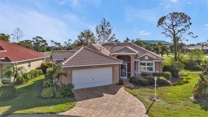 This Burnt Store Marina POOL home sits just off the 8th fairway - Beach Home for sale in Punta Gorda, Florida on Beachhouse.com