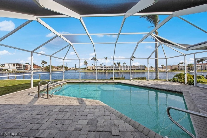 This beautiful home boasts outstanding water views from - Beach Home for sale in Cape Coral, Florida on Beachhouse.com