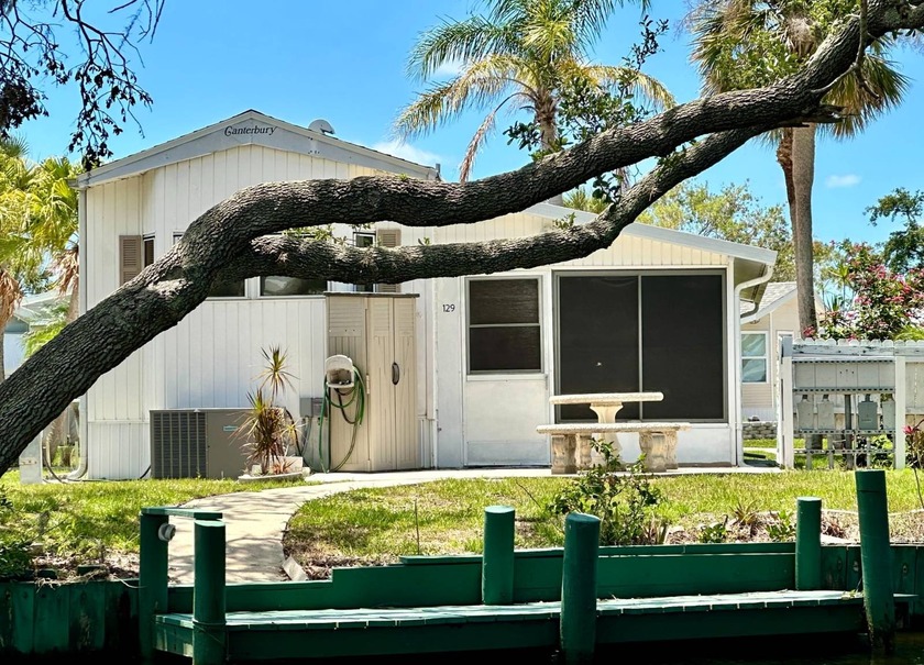 Waterfront Living with Modern Comforts...  This charming home - Beach Home for sale in Nokomis, Florida on Beachhouse.com