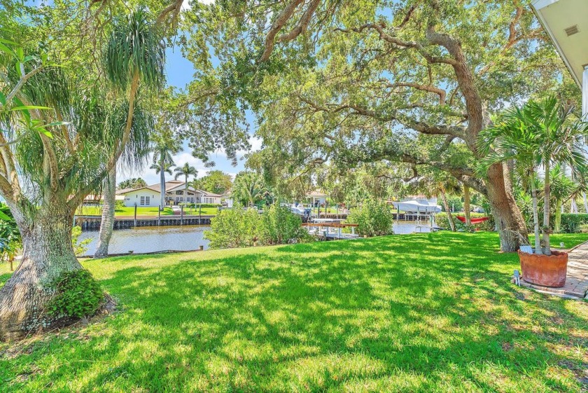Nestled in Palm Beach Gardens, this Key West-style residence is - Beach Home for sale in Palm Beach Gardens, Florida on Beachhouse.com