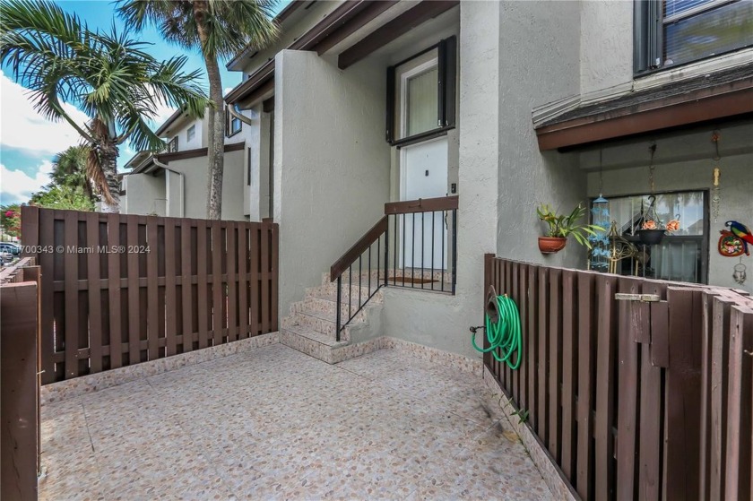 Discover the charm of townhome living in this 2-bedroom, 2 - Beach Condo for sale in Miami, Florida on Beachhouse.com