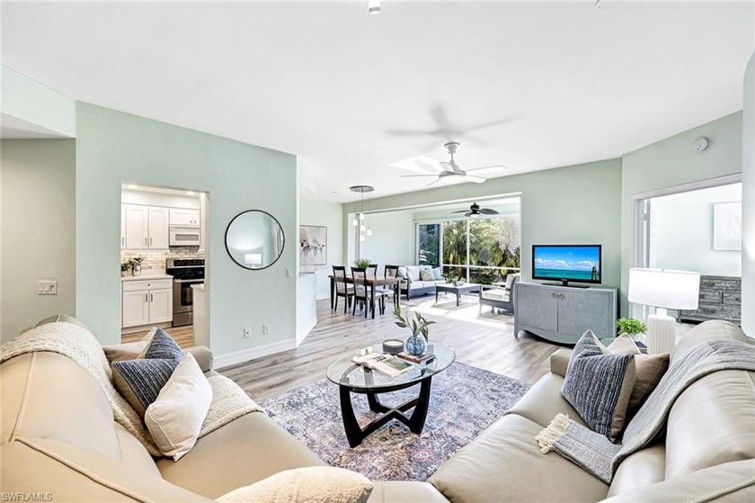 Wake up to tranquil south-facing lake views in this beautifully - Beach Condo for sale in Bonita Springs, Florida on Beachhouse.com