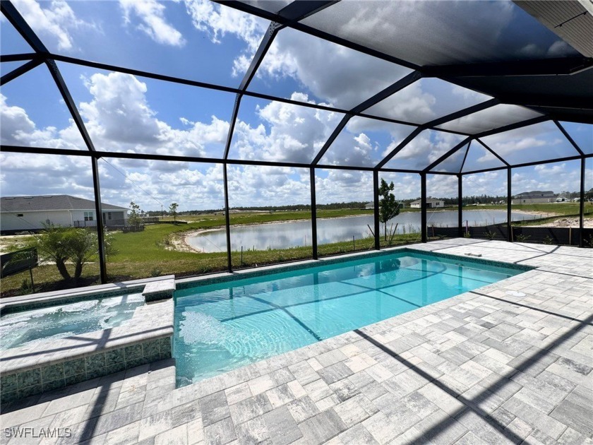 EXTRAORDINARY NEW CONSTRUCTION WATER VIEW HOME WITH PRIVATE POOL - Beach Home for sale in Punta Gorda, Florida on Beachhouse.com