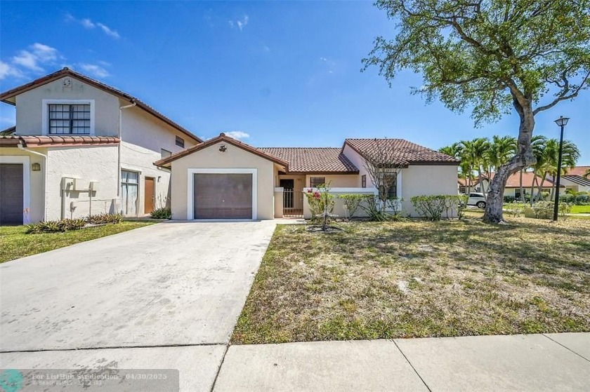 Welcome home to the beautifully maintained community of - Beach Home for sale in Deerfield Beach, Florida on Beachhouse.com