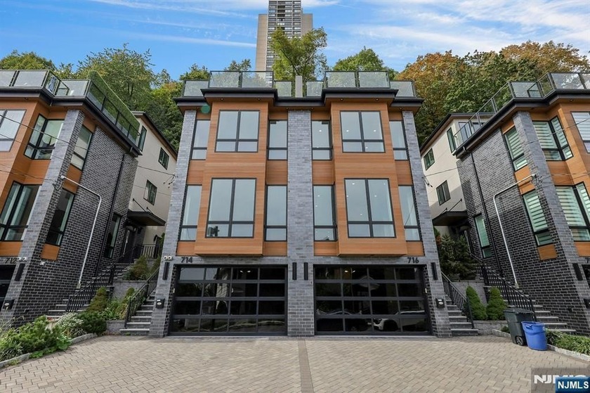 EXPERIENCE ELEVATED LUXURY FOUR-STORY TOWNHOME, WHERE REFINED - Beach Home for sale in Edgewater, New Jersey on Beachhouse.com