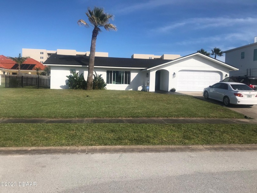 Walk to the beach from this beautifully remodeled 3-bedroom - Beach Home for sale in Ponce Inlet, Florida on Beachhouse.com