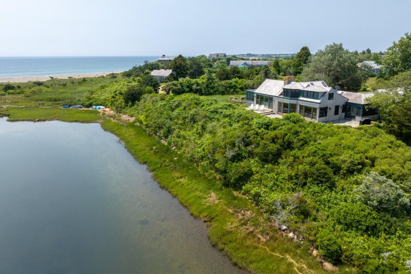 Waterfront home on Stonewall Pond with Ocean Views.  Nestled - Beach Home for sale in Chilmark, Massachusetts on Beachhouse.com