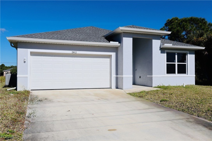 This stunning 2026 new construction 3 bedroom, 2 bathroom - Beach Home for sale in Lehigh Acres, Florida on Beachhouse.com