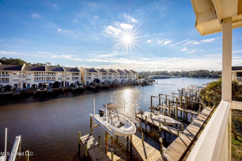 This beautifully updated and furnished waterfront condo with - Beach Condo for sale in Ocean Springs, Mississippi on Beachhouse.com