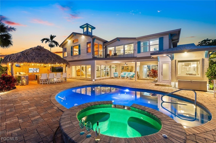 This four-bedroom, four-bath riverfront home is one of those - Beach Home for sale in Cape Coral, Florida on Beachhouse.com