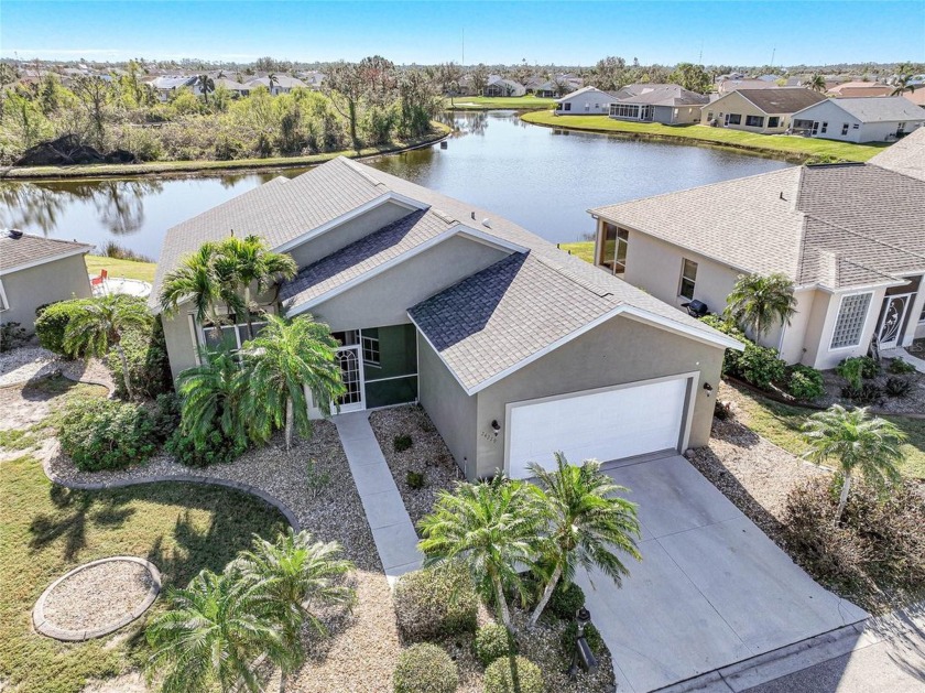 GATED 55+ Golf community home with a lake view!! This beauty is - Beach Home for sale in Punta Gorda, Florida on Beachhouse.com