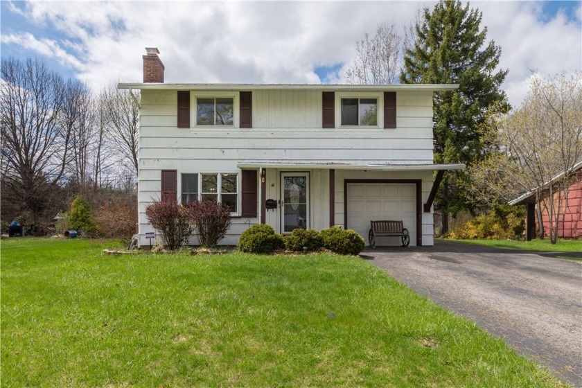 A perfect blend of comfort and character can be found in this - Beach Home for sale in Greece, New York on Beachhouse.com