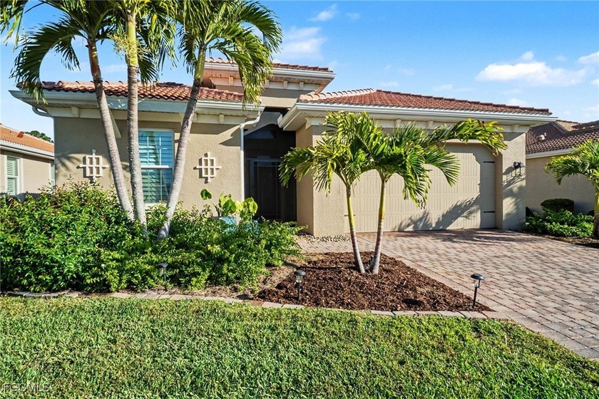 MOVE-IN READY | MAJOR UPGRADES | GOLF & WATER VIEWS! This - Beach Home for sale in North Fort Myers, Florida on Beachhouse.com