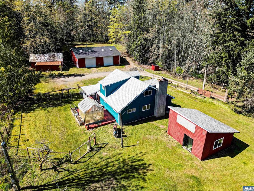 Escape to a lifestyle where the whispers of a bustling creek - Beach Home for sale in Port Angeles, Washington on Beachhouse.com