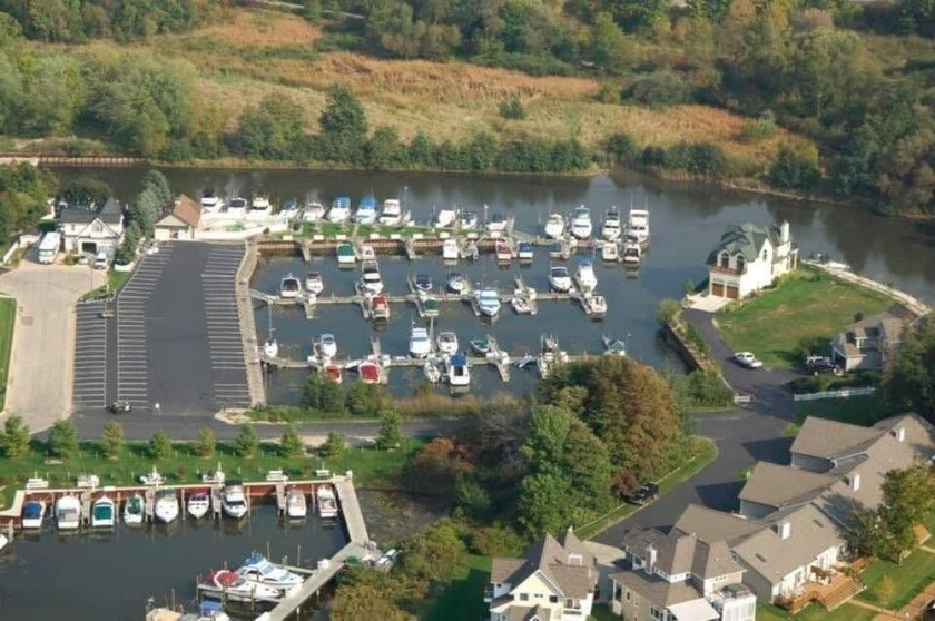 30' Floating Boat Dock with Boat Box in Oak Harbor Marina - Beach Lot for sale in South Haven, Michigan on Beachhouse.com