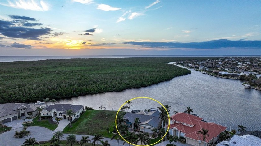 Set on an exclusive tip lot with direct sailboat access to - Beach Home for sale in Punta Gorda, Florida on Beachhouse.com