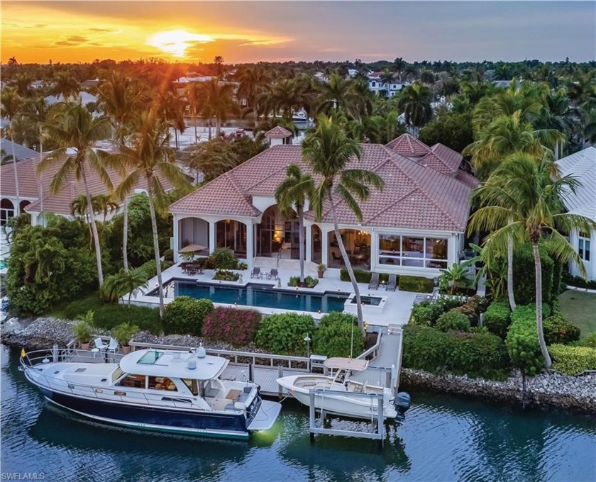With lush landscaping and vistas of Runaway Bay, this Port Royal - Beach Home for sale in Naples, Florida on Beachhouse.com
