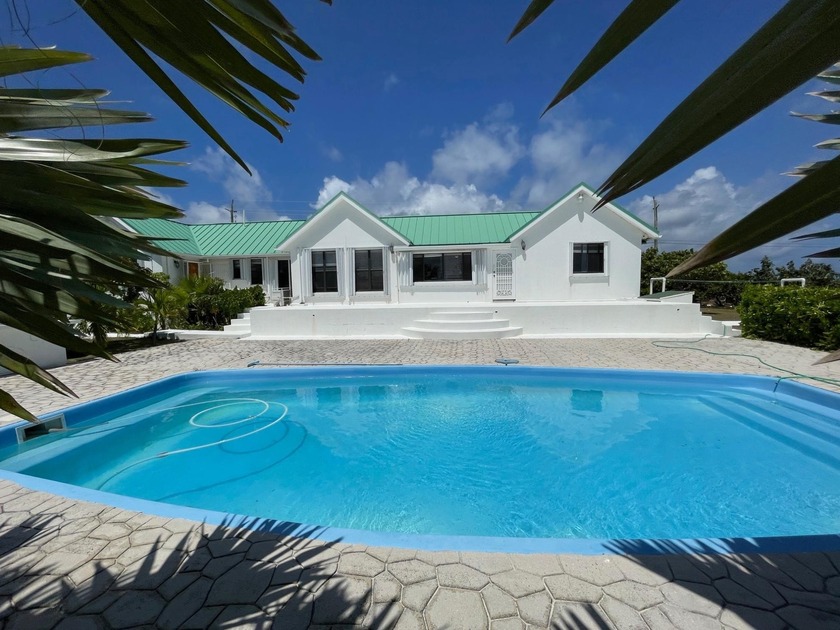 This meticulously maintained, 4 bedroom / 3 bath villa is set - Beach Home for sale in ,  on Beachhouse.com