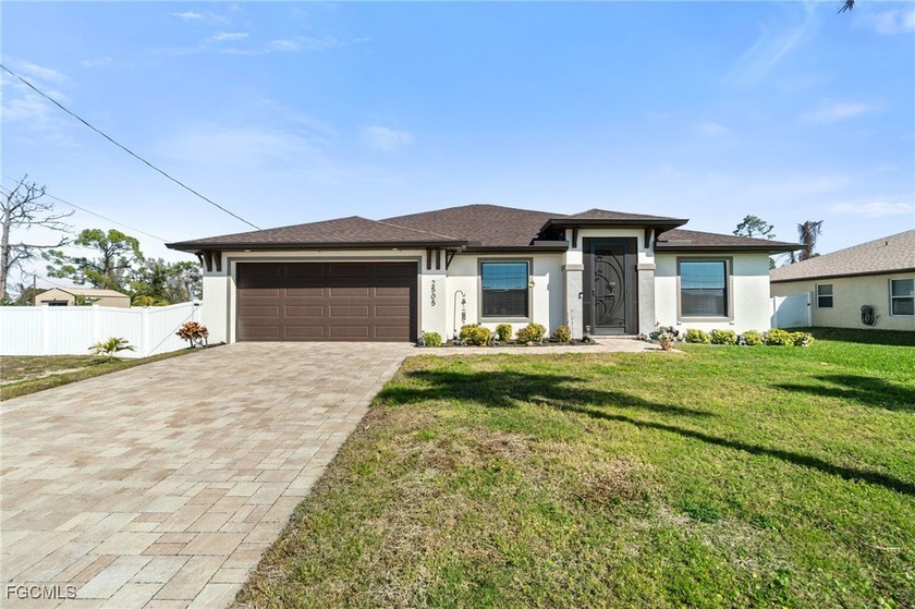 Priced to sell, this stunning 4-bedroom, 2-bath heated pool home - Beach Home for sale in Cape Coral, Florida on Beachhouse.com
