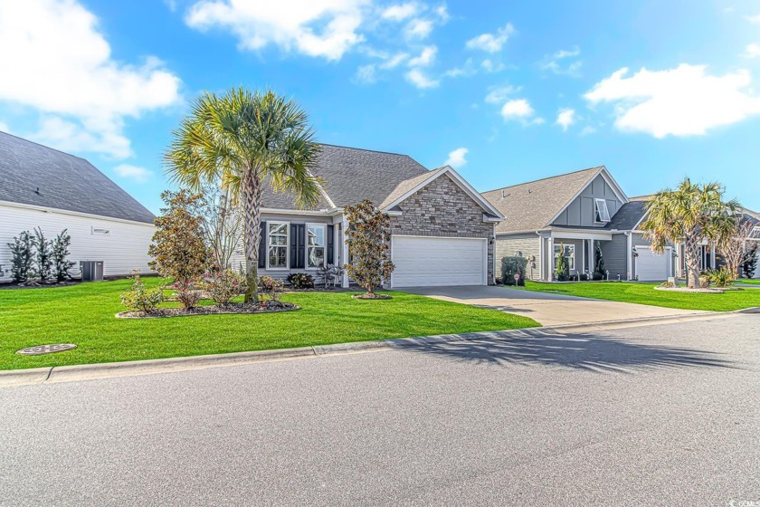 Welcome to 173 Heron Lake Court, a stunning waterfront retreat - Beach Home for sale in Murrells Inlet, South Carolina on Beachhouse.com