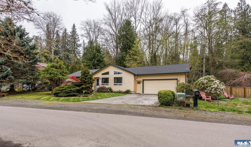Tucked away on a wooded lane is this lovely 3 bedroom home - Beach Home for sale in Sequim, Washington on Beachhouse.com