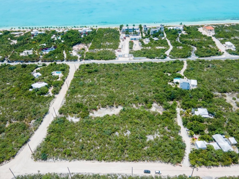 You can walk to beautiful Long Bay Beach with its fine white - Beach Lot for sale in Providenciales,  on Beachhouse.com