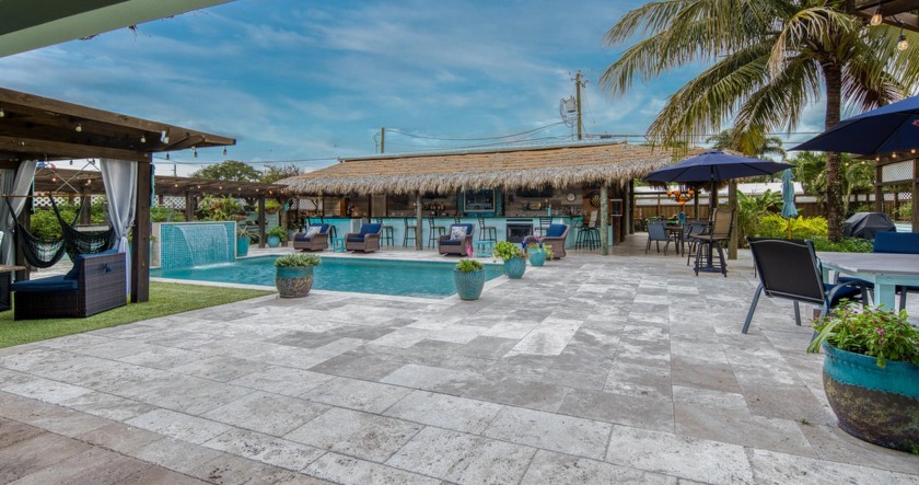You've heard of ''resort style'' backyards, now see the real - Beach Home for sale in Lake Worth Beach, Florida on Beachhouse.com
