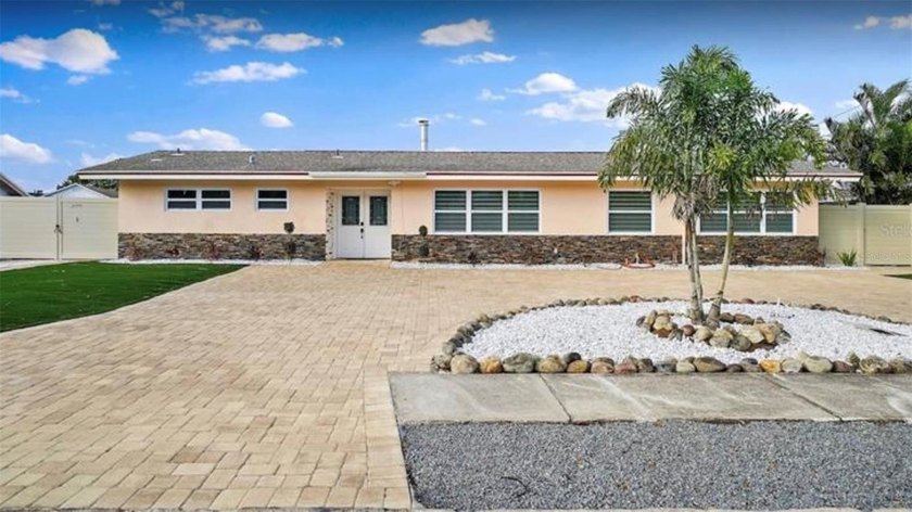 Welcome to Waterfront Living! This stunning, fully renovated - Beach Home for sale in St. Petersburg, Florida on Beachhouse.com
