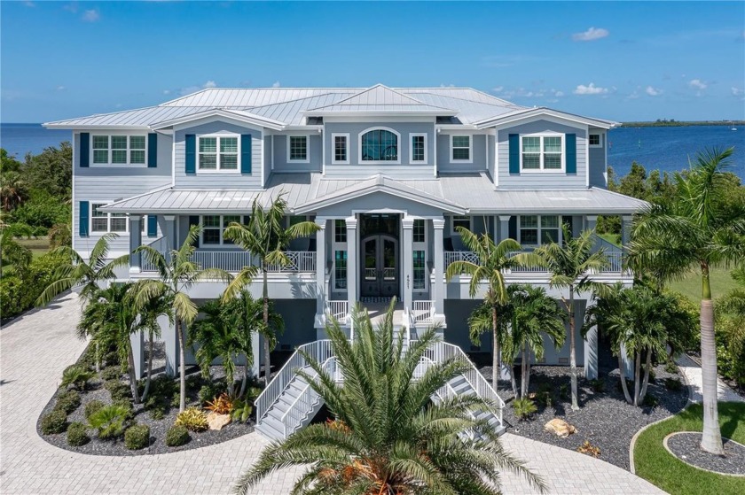 Exquisite, three-story home on more than half an acre w/western - Beach Home for sale in Port Charlotte, Florida on Beachhouse.com