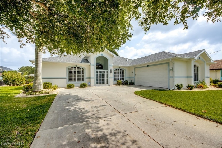 FRESHWATER CANAL HOME with HEATED POOL/JACUZZI, AND BOAT DOCK IN - Beach Home for sale in Cape Coral, Florida on Beachhouse.com