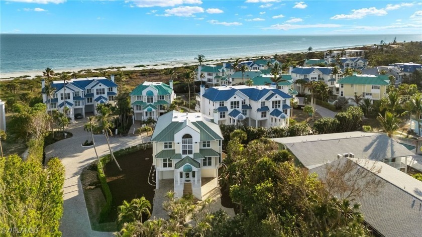 Nestled in an exclusive beachfront gated community, this - Beach Home for sale in Sanibel, Florida on Beachhouse.com