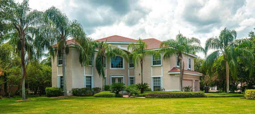 An amazing opportunity to own this beautiful Custom Lakefront - Beach Home for sale in Tampa, Florida on Beachhouse.com