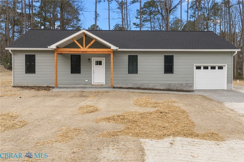 Blending timeless Craftsman-inspired charm with modern - Beach Home for sale in Gloucester, Virginia on Beachhouse.com