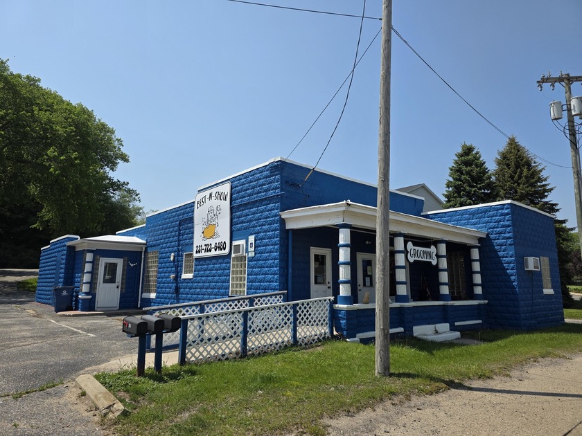 High-visibility mixed-use triplex located in Manistee's North - Beach Home for sale in Manistee, Michigan on Beachhouse.com