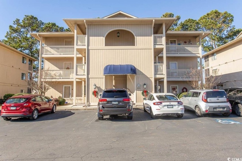 Walk into your own slice of beach life with this meticulously - Beach Condo for sale in Little River, South Carolina on Beachhouse.com