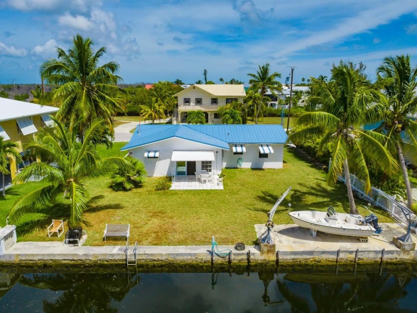 Adorable canal front Key's Retreat in Tropical Bay!  This single - Beach Home for sale in Big Pine Key, Florida on Beachhouse.com