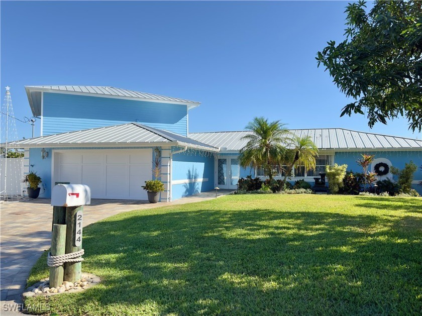 PREPARED TO BE CAPTIVATED BY THIS TRULY STUNNING WATERFRONT HOME - Beach Home for sale in North Fort Myers, Florida on Beachhouse.com