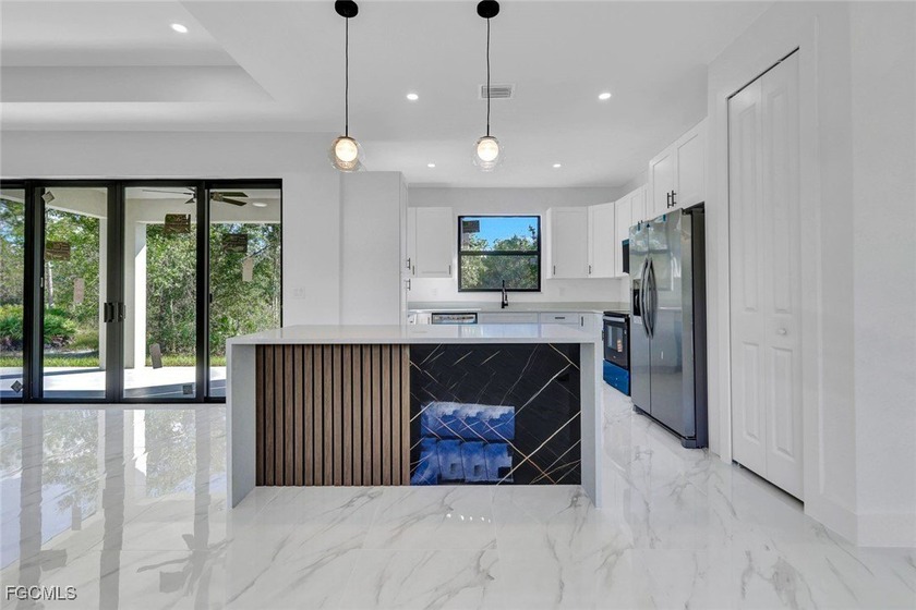 Experience modern luxury and family-friendly living in this - Beach Home for sale in Lehigh Acres, Florida on Beachhouse.com