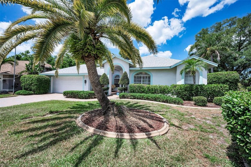 Welcome to this beautiful pool home in Gulf Trace where - Beach Home for sale in Holiday, Florida on Beachhouse.com