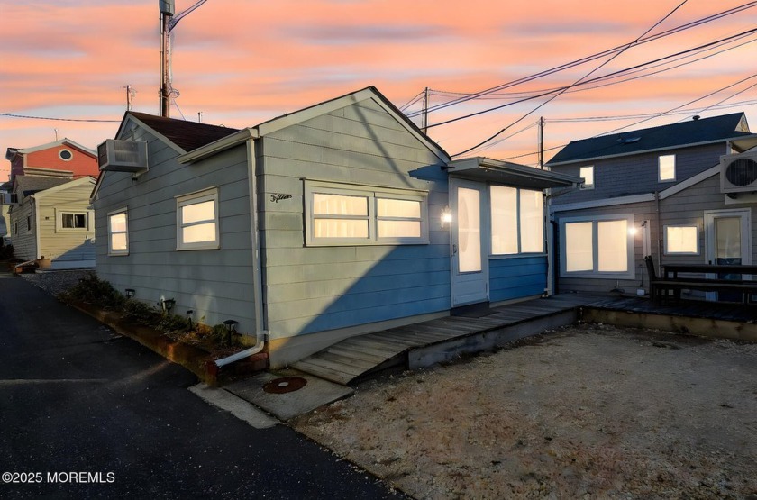 This charming beach cottage is situated on the beach block in - Beach Home for sale in Lavallette, New Jersey on Beachhouse.com