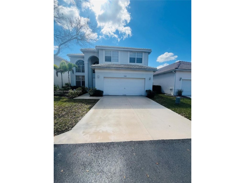 Only 64 homes in the Gated Community of Fairway Pointe at - Beach Home for sale in Margate, Florida on Beachhouse.com