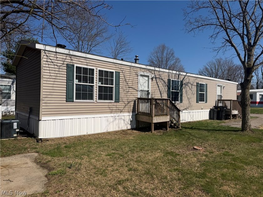 Tucked in the back of the Mobie Grove Park, this 2020 built - Beach Home for sale in Conneaut, Ohio on Beachhouse.com