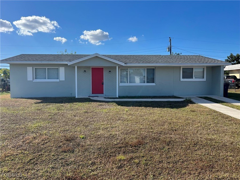 Cute, solid, and move-in-ready, this concrete block home with - Beach Home for sale in Lehigh Acres, Florida on Beachhouse.com