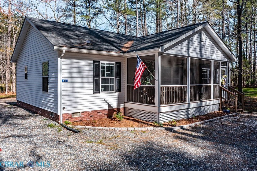 Tucked inside a sought-after water-access community, this - Beach Home for sale in Heathsville, Virginia on Beachhouse.com
