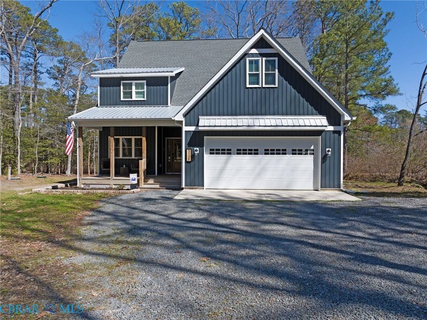 Custom-built modern farmhouse, less than five years young, sited - Beach Home for sale in Cobbs Creek, Virginia on Beachhouse.com